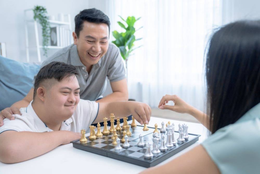 Sometimes, the happiest family memories are created through the simplest games and laughter together.