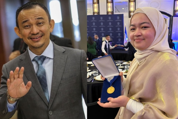 Dr Maszlee (kiri) bangga dan gembira dengan pencapaian anak sulungnya, Nusaybah (kanan). 