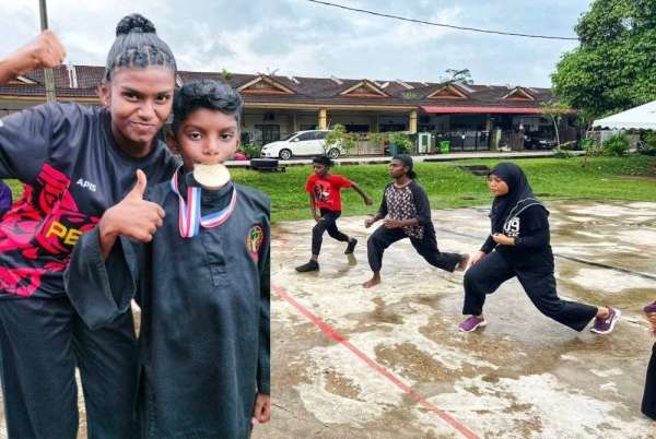 Yashvini dan Thilesh sama-sama berlatih bersama rakan pasukan.