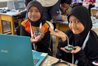 Gelagat murid yang tekun melaksanakan setiap modul semasa program.