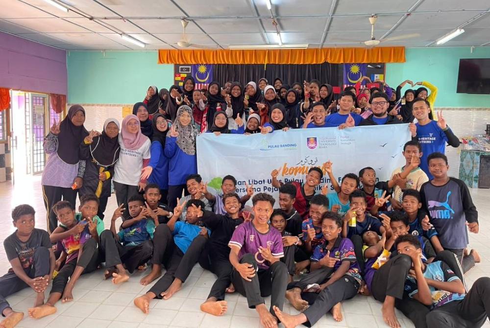 Sukarelawan bersama komuniti Orang Asli dalam Program Banding Trail dan Khidmat Komuniti baru-baru ini.