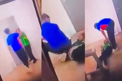 Tangkap layar video tular memaparkan seorang remaja dipukul sekumpulan individu. 