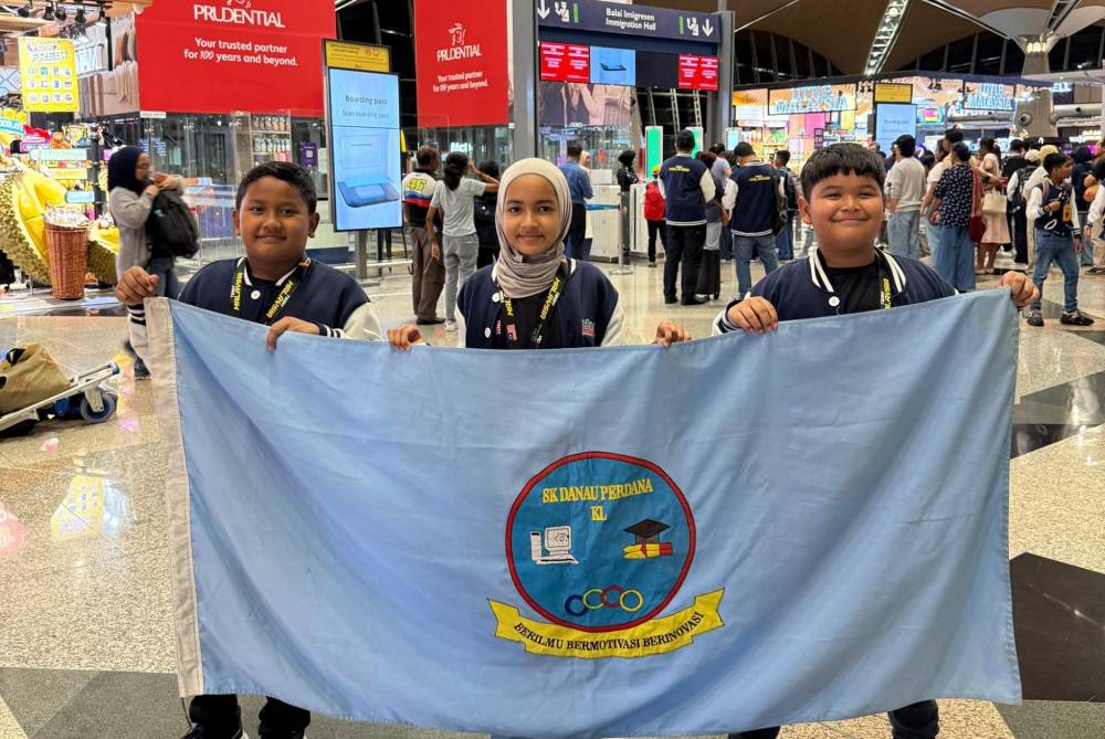 Minat pada robotik membawa tiga murid SK Danau Perdana hingga ke pentas dunia, sekali gus mengharumkan nama sekolah dan Malaysia.