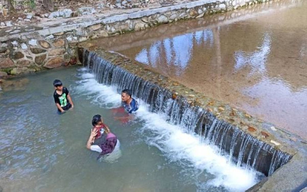 Visitors start visiting the waterfall area at Cabin Chalet Gunung Pulai, Kulai.