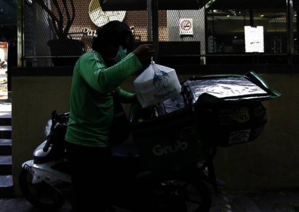 E-hailing companies are also responsible to inculcate safe driving etiquette among their riders -- Bernama Photo.