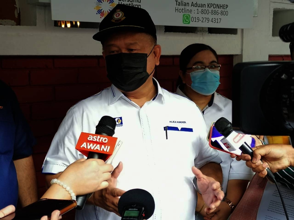 Minister of Domestic Trade and Consumer Affairs Datuk Seri Alexander Nanta Linggi at the launching of the broadcasting system.