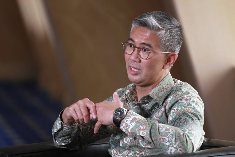 Raising the minimum wage is crucial for Malaysia to compete with other developing economies, says Tengku Zafrul. - Photo by Muhammad Hafiz Adnan.