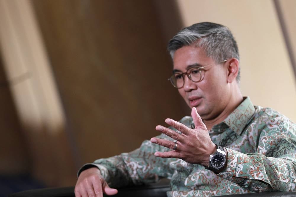 While deeply unpopular, consumption tax like GST is crucial to increase government revenue, says Tengku Zafrul. - Photo by Muhammad Hafiz Adnan.