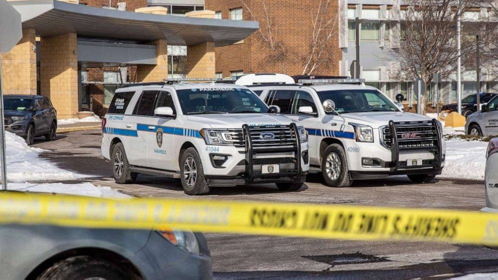 Police vehicles sit in front of South Education Center Academy in Richfield, Minnesota on Feb 2, 2022. - AFP
