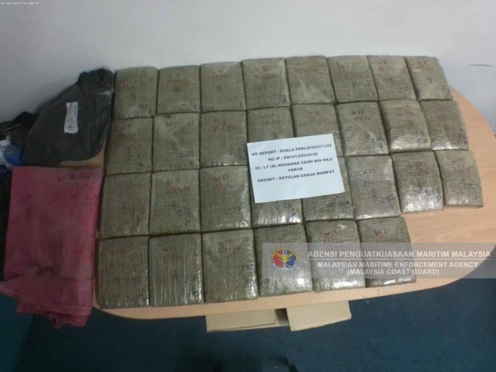The Malaysian Maritime Enforcement Agency (MMEA) Kuala Perlis Maritime Zone foiled an attempt to smuggle in 30kgs of compressed cannabis lumps, worth almost RM150,000, in 'Op Khas' conducted in Kuala Perlis waters, yesterday. - Source: Malaysian Maritime Enforcement Agency (MMEA) Facebook