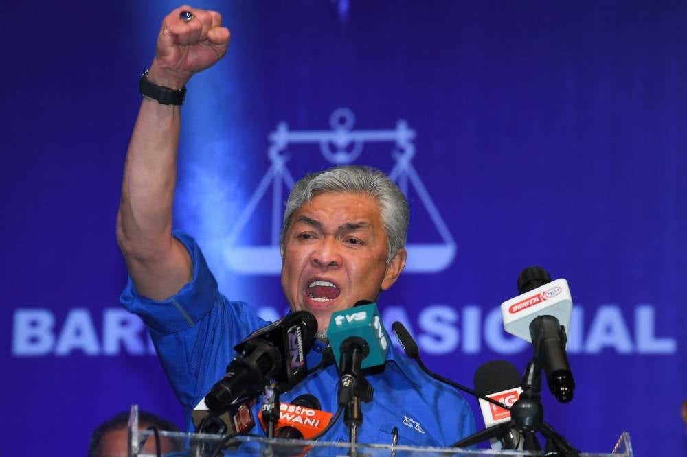 BN chairman Datuk Seri Dr Ahmad Zahid Hamidi giving a speech at the launching of the Johor BN west zone machinery operations centre at the EduCity Sports Complex. - BERNAMA