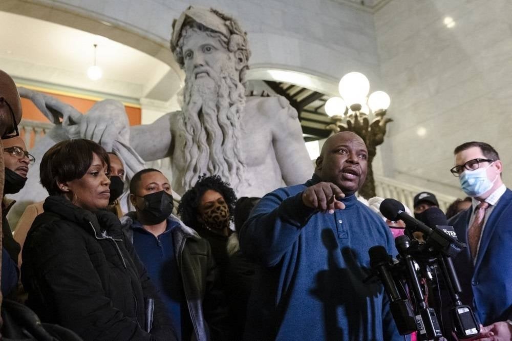 Andrew Tyler (Centre), uncle of Amir Locke, speaks during a press conference at City Hall in Minneapolis, Minnesota on February 4, 2022. -AFP