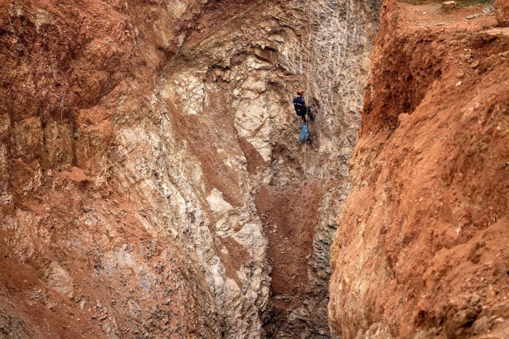 Moroccan rescuers edge closer to save the boy trapped in the well. - AFP