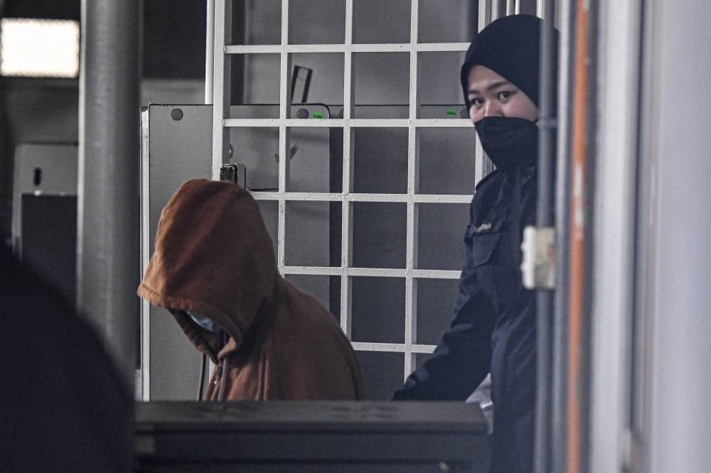 A 15- year old girl believed to be a rape victim was charged at the Kemaman magistrate's court on Feb 15, with murdering her newborn baby. - Bernama Photo.