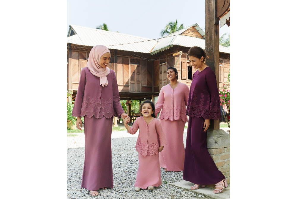 From left, the Ayu blouse and skirt combo in deep mauve and rose dawn, and Embun blouse and skirt combo in prune. Prices range from RM199 to RM299.
