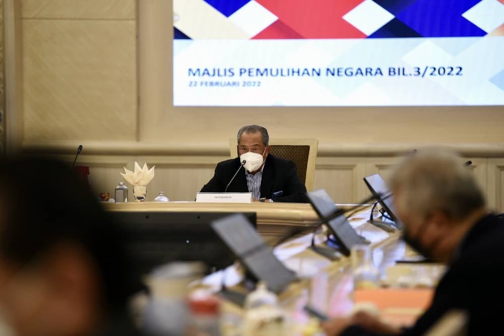 National Recovery Council (NRC) chairman Tan Sri Muhyiddin Yassin chairing the NRC meeting at the Finance Ministry, today. - BERNAMA