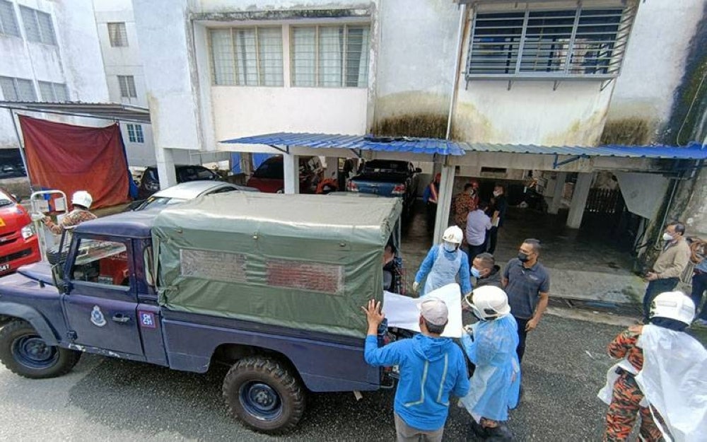 The bodies of both victims were taken to the Sultanah Hajjah Kalsom Hospital, Tanah Rata for post-mortem. - Photo source: Pahang Fire and Rescue Department