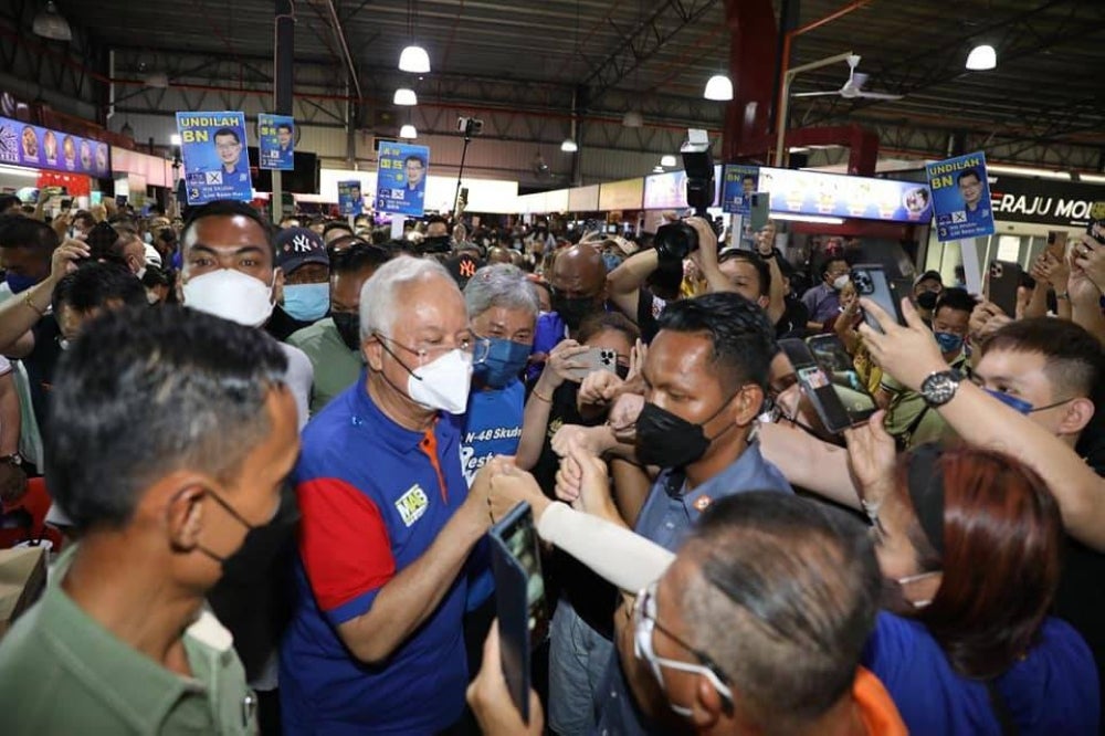 Najib Razak appears at another crowded event despite being fined five times for breaking Covid SOPs.