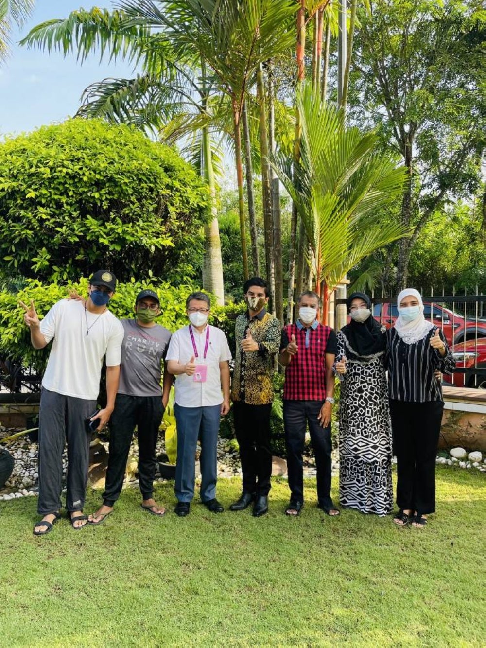 Syed Saddiq Syed Abdul Rahman, his family members and Liew Chin Tong. - Photo source: Syed Saddiq/Twitter