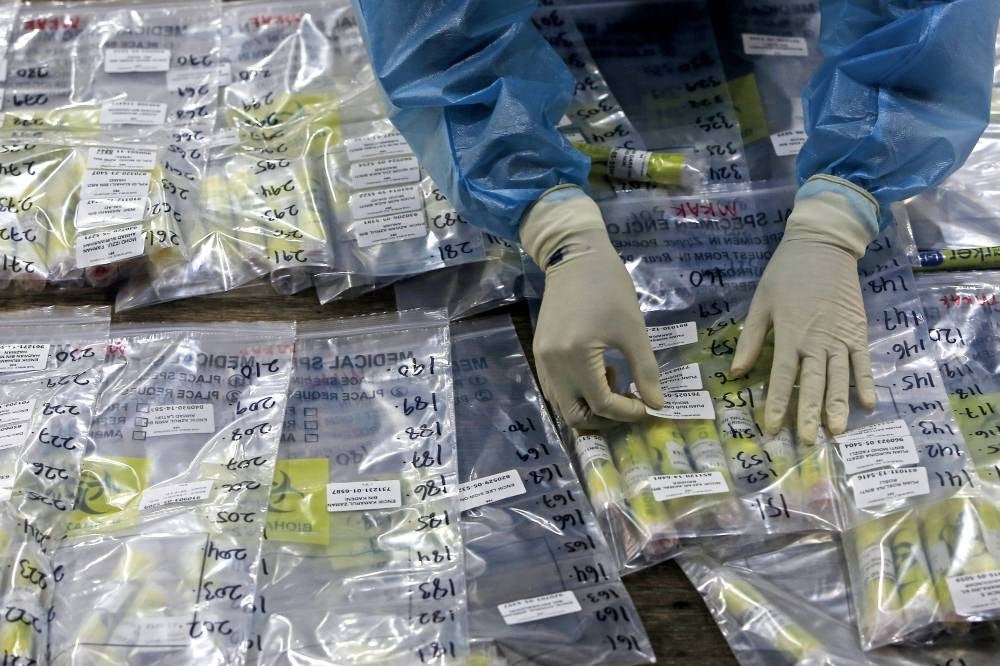 The Health Ministry recorded 19,105 new positive cases including 386 imported cases in the last 24 hours. - Bernama Photo