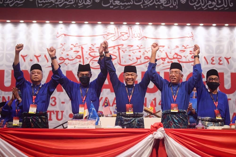 Umno senior leaders during the party's recent annual general assembly. Party deputy president Mohamad Hasan (second from left) has assured that 70 per cent of their candidates for GE15 will likely be new and young faces. - Bernama Photo