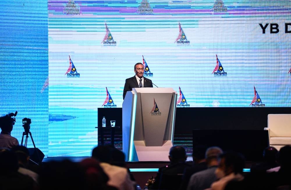 Senior Defence Minister Datuk Seri Hishammuddin Hussein delivering a keynote address at Putrajaya Forum 2022, with the theme ‘Shared Regional Responsibility’, at the the Malaysia International Trade and Exhibition Centre (Mitec), today. - BERNAMA