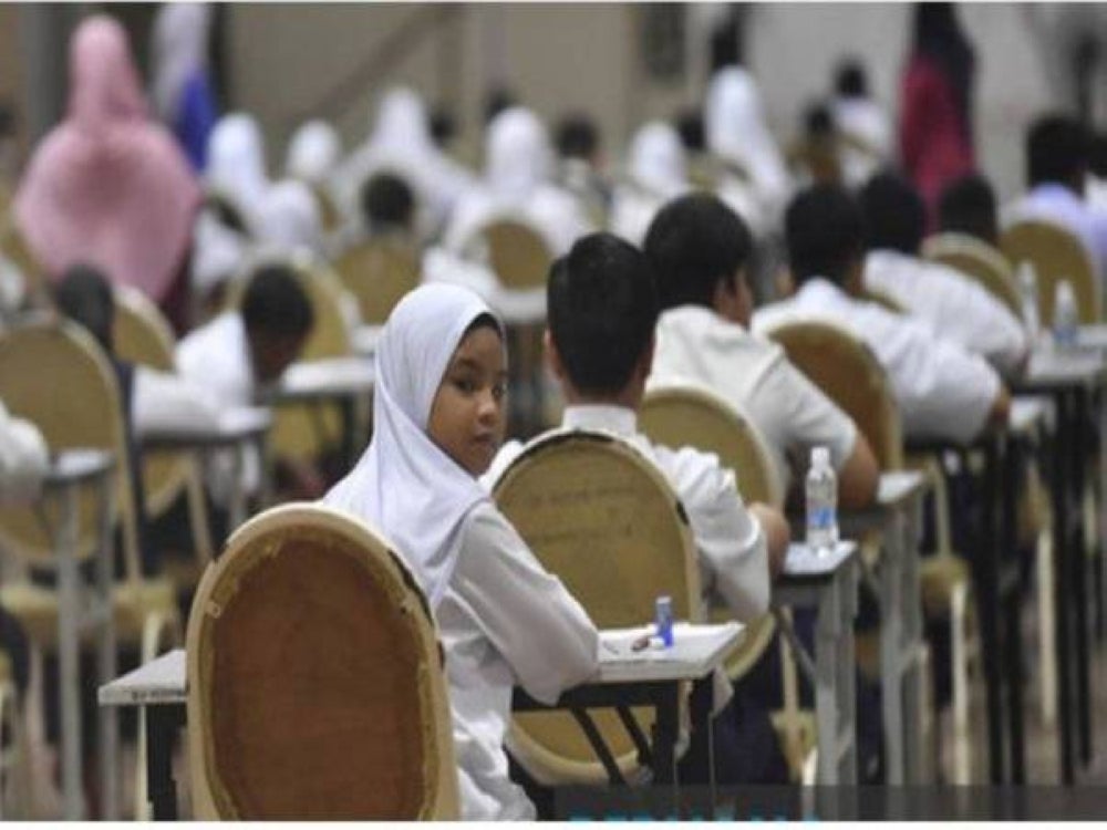 A student in an Islamic religious school looks on