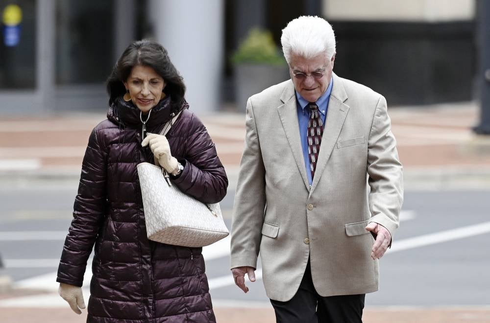 Diane and John Foley, the parents of James Foley, a US journalist slain by Islamic State militants, return to the Alexandria federal court house after a break in the trial of IS member El Shafee Elsheikh, the 
