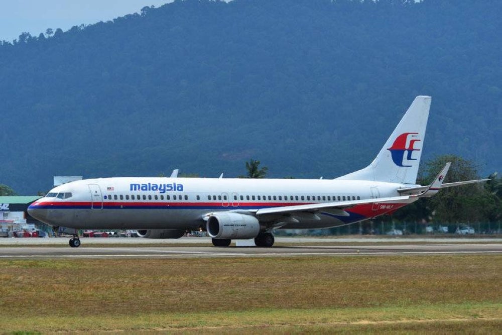 Three passengers who boarded Malaysia Airlines flight MH2664 last Sunday (April 3) are seeking the airline and the Malaysian Civil Aviation Authority to conduct a transparent investigation into the plane's emergency incident. - 123RF Photo
