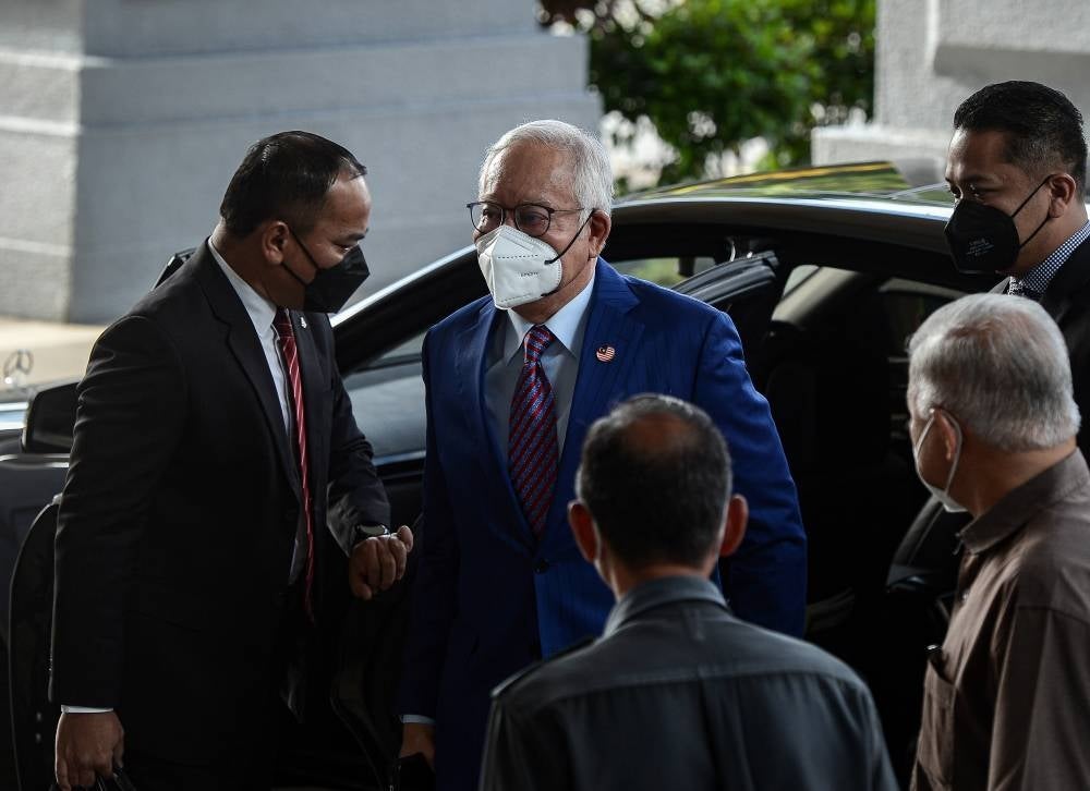Datuk Seri Najib Razak at the Kuala Lumpur Courts Complex for his trial on the alleged tampering of the 1MDB final audit report, today. - BERNAMA