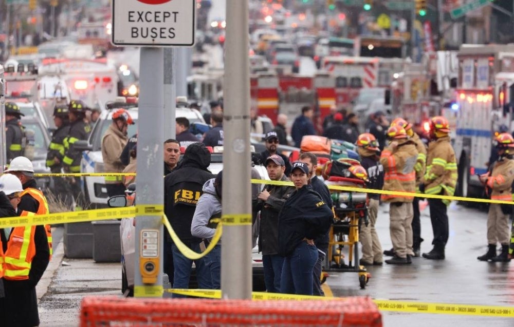 New York City Police and Fire Department officials on the scene of a reported multiple shooting at a New York City Subway station in the Brooklyn borough of New York. - Photo: EPA