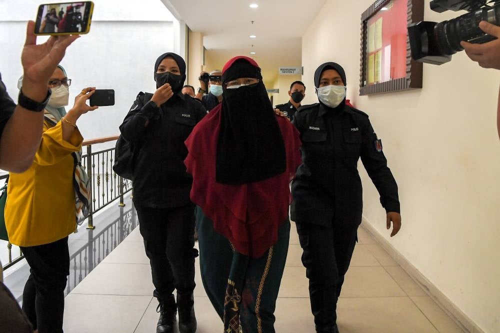 Kindergarten owner Khairuzilawati Ruslan, 57, pleaded not guilty to exposing two children under her care to the risk of injury and drowning two months ago. - BERNAMA