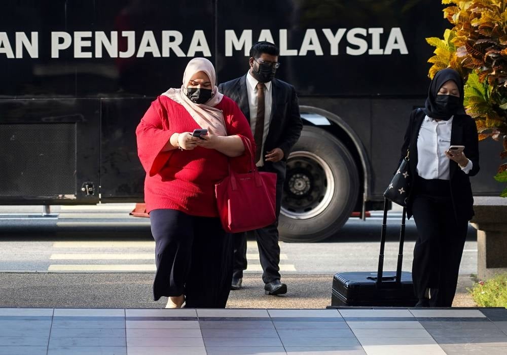 Rumah Bonda founder Siti Bainun Ahd Razali at the Kuala Lumpur Courts Complex for her trial, today. - BERNAMA