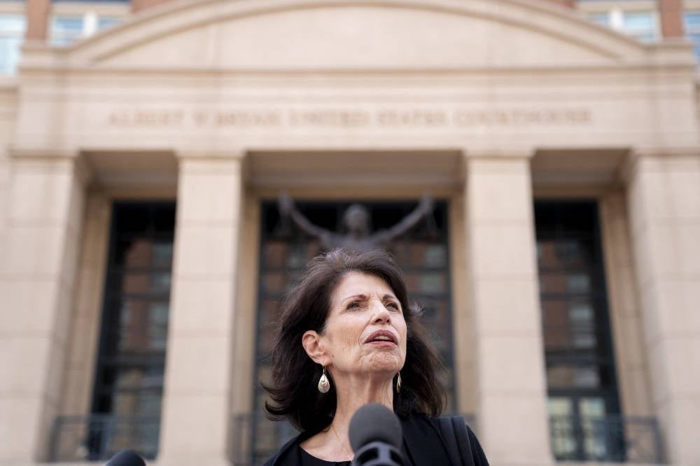 Diane Foley, the mother of American journalist James Foley, slain by IS militants, speaks to reporters outside the Albert V. Bryan Federal Courthouse following the trial of IS member El Shafee Elsheikh, the “Beatle”, in Alexandria, Virginia, on April 14, 2022. - AFP