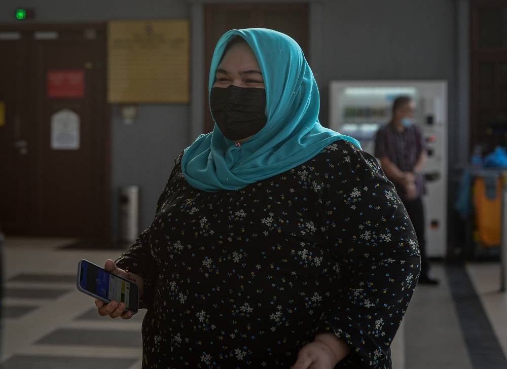 Rumah Bonda founder Siti Bainun Abd Razali at the Kuala Lumpur Courts Complex, today, for her trial for neglecting and abusing a down syndrome girl known as Bella. - BERNAMA