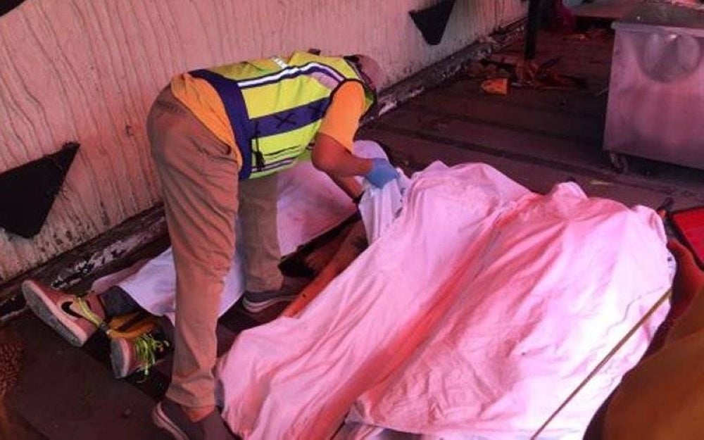 Two men and a woman were found dead after they were believed to have been trapped when a fire broke out at a karaoke joint in Putra Mergong, Alor Setar. (Fire and Rescue Department picture)