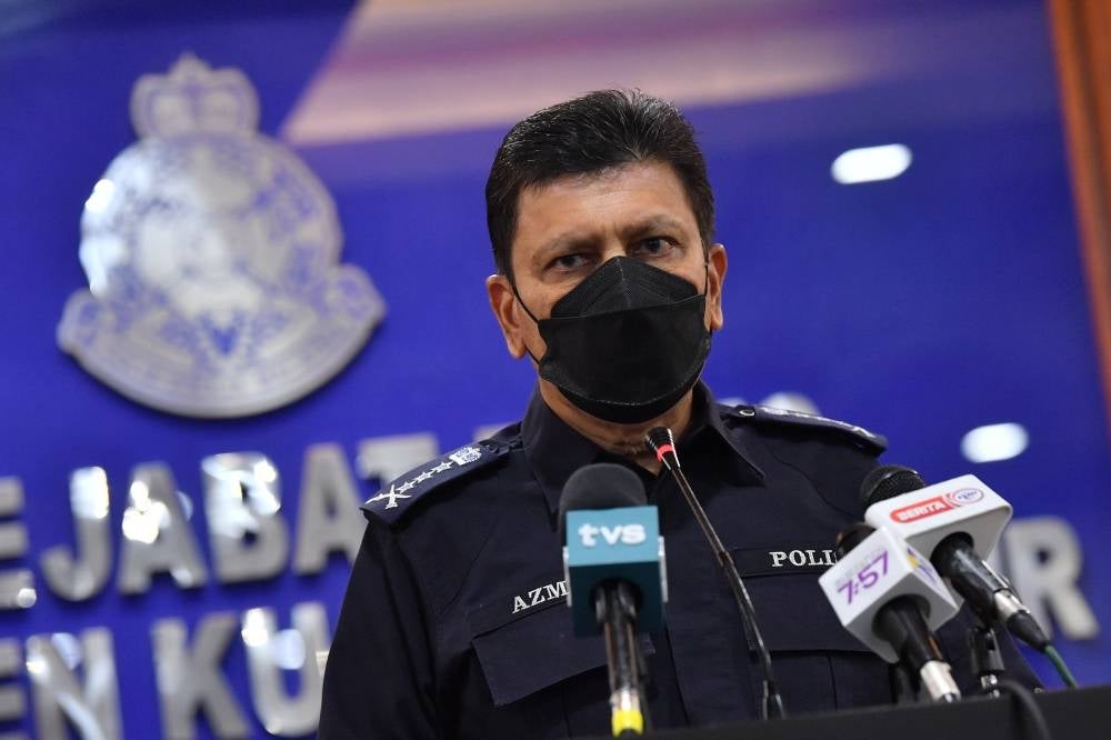 Kuala Lumpur police chief Datuk Azmi Abu Kassim during a press conference on the arrest of two suspects in relation to the shooting incident, at a hotel in Bukit Bintang. - BERNAMA