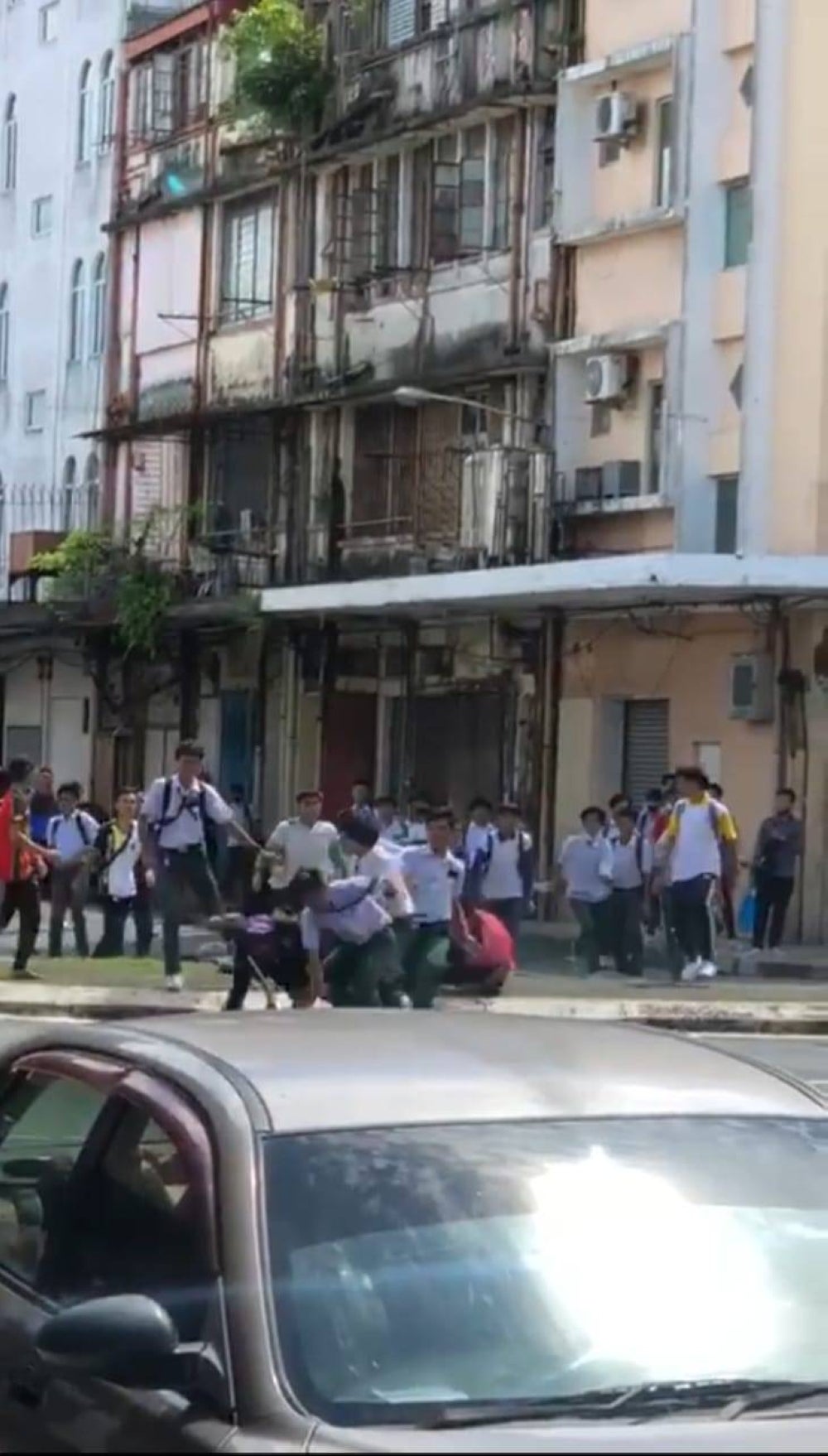 Series of photos of students fighting in Sandakan