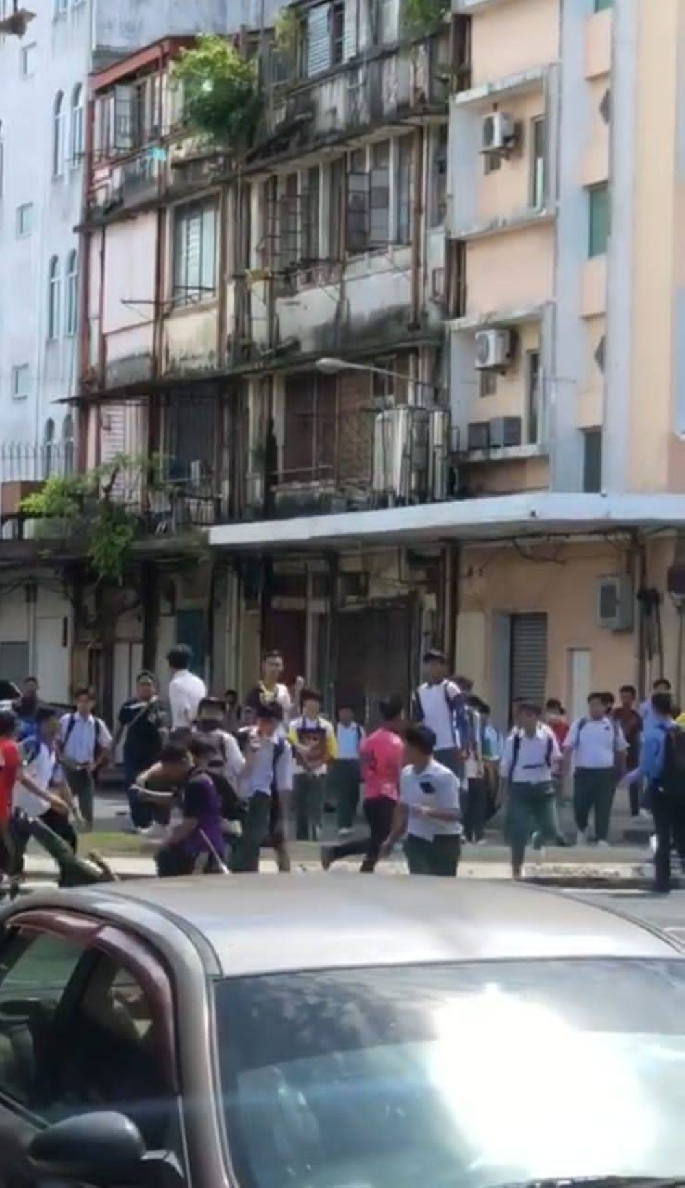 Series of photos of students fighting in Sandakan