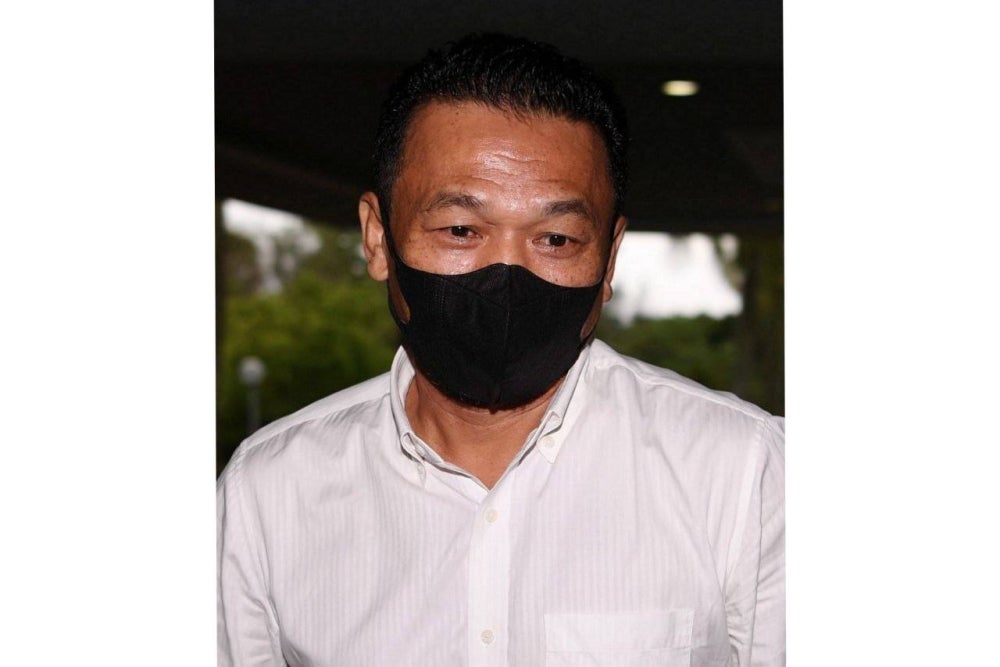 Armin Zaharin Ahmad Zambri had his jail sentence set aside after the High Court fined him RM8,000 for caning his son on the hand four years ago. - BERNAMA