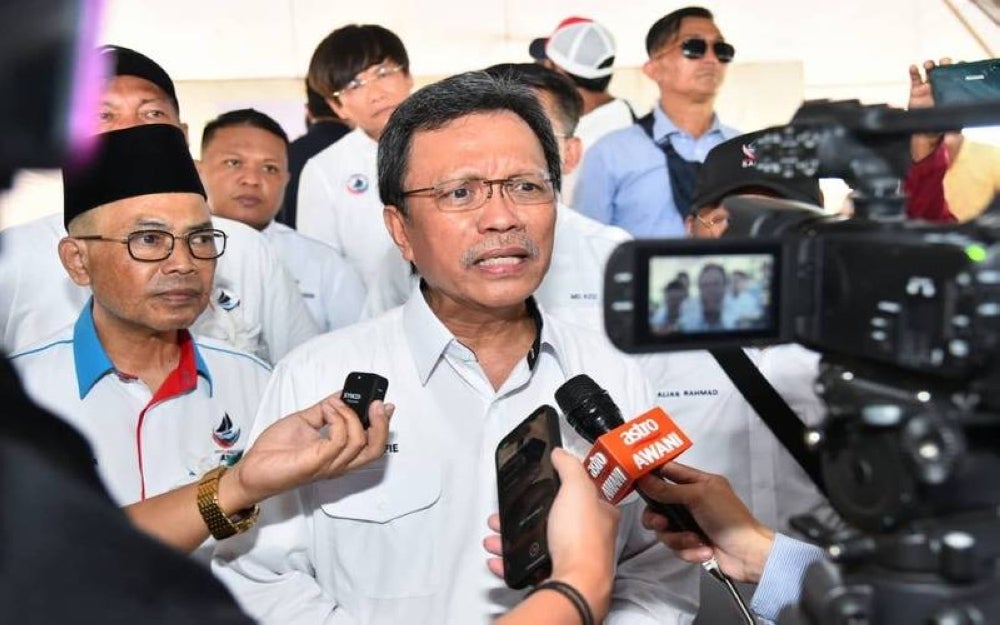 Mohd Shafie when met by reporters after attending the 'Leaders with the People' programme in Libaran, Sandakan.
