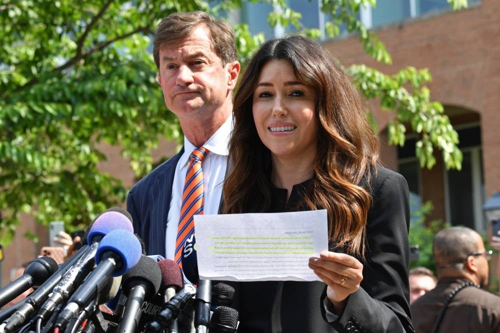 Ben Chew (L) and Camille Vasquez, attorneys for US actor Johnny Depp, address the media outside the Fairfax County Circuit Courthouse in Fairfax, Virginia, on June 1, 2022. Depp was not seen present in court. (Photo by Nicholas Kamm / AFP)