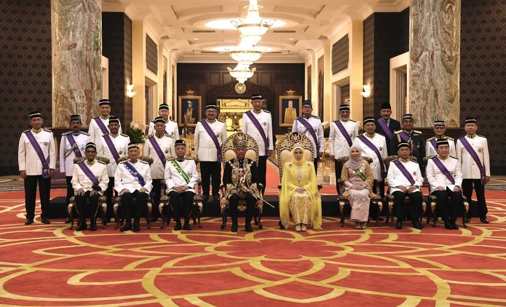 Their Majesties with several 2022 Federal awards recipients at Istana Negara today. Photo - BERNAMA