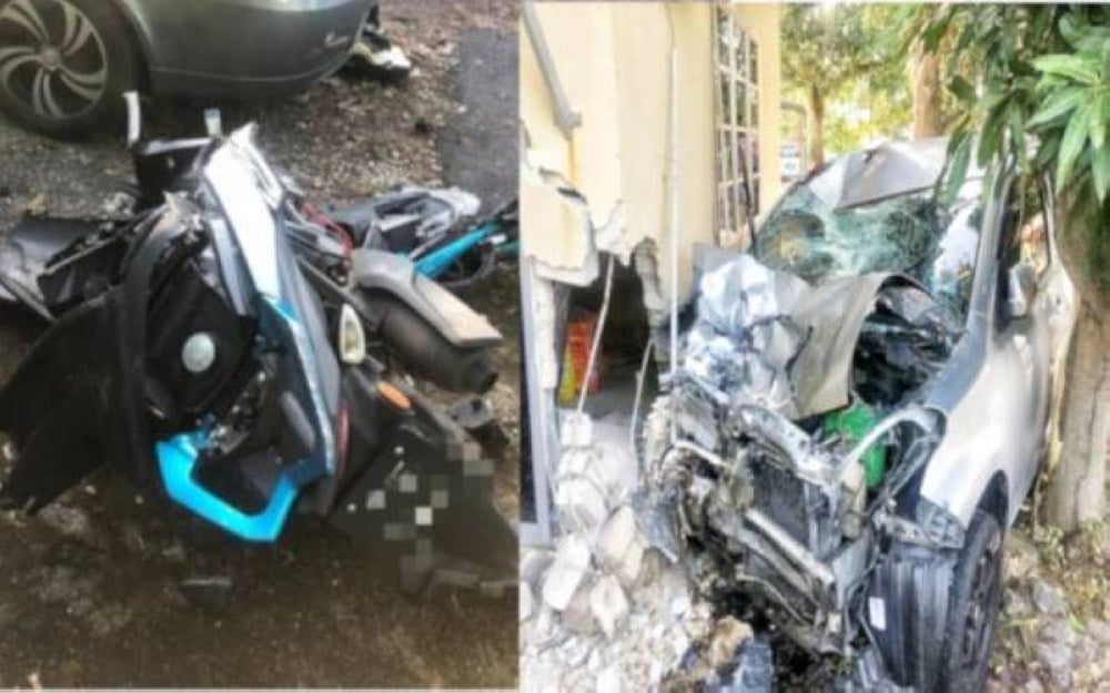 Ezuddin Mohammad and his wife, Surayah Muhamat were on their way from Melaka to Merlimau in the 7.45am incident when the vehicle crashed into their bike. Photo source: Sinar Harian