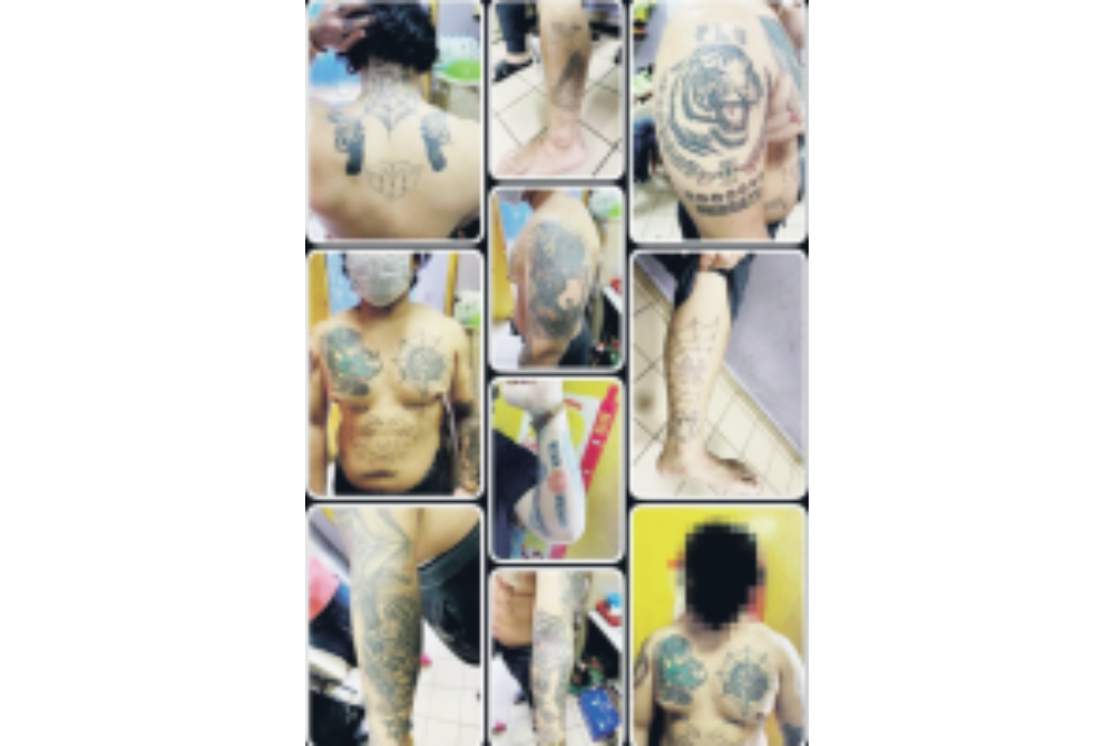 Tattoos of gang members. Photo: SINAR HARIAN