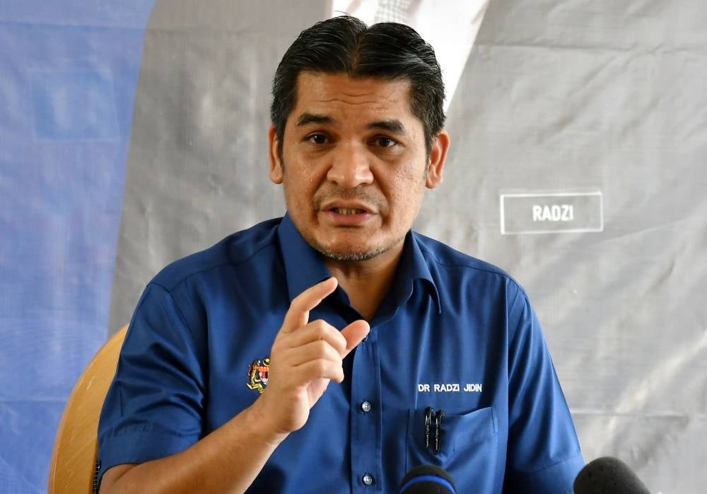 Radzi said the ministry is looking into appropriate teaching approaches that can be adopted to address the issue of the low literacy rate among some students in the country. FILE PIX.