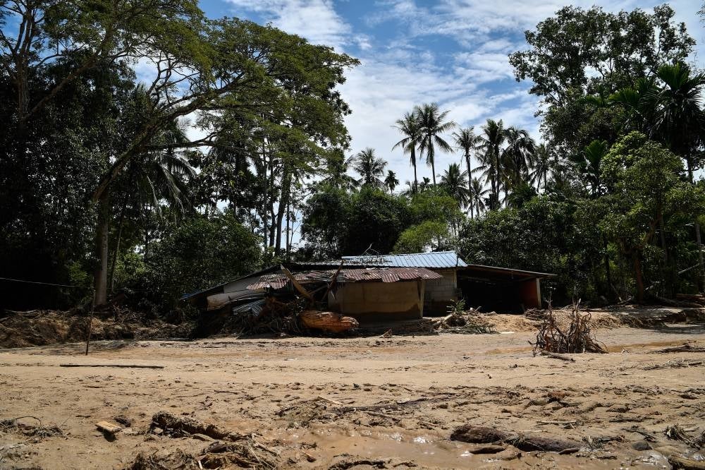 A house affected by the flood in Kampung Iboi, Baling. - Photo: BERNAMA