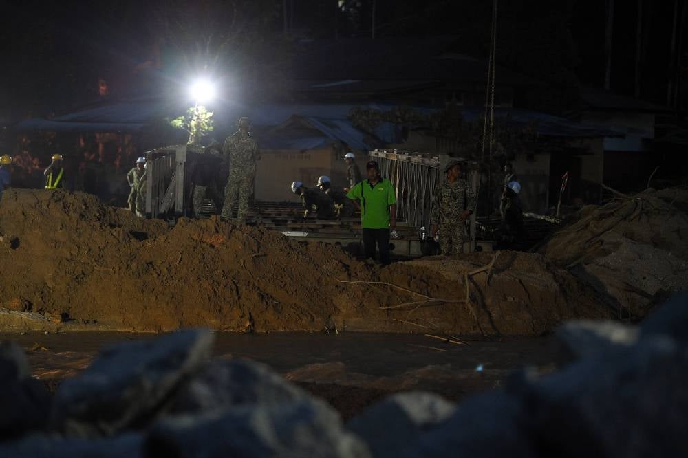 The 90-foot-long and 18-foot -wide bridge could accommodate loads of up to five tonnes. Photo: BERNAMA