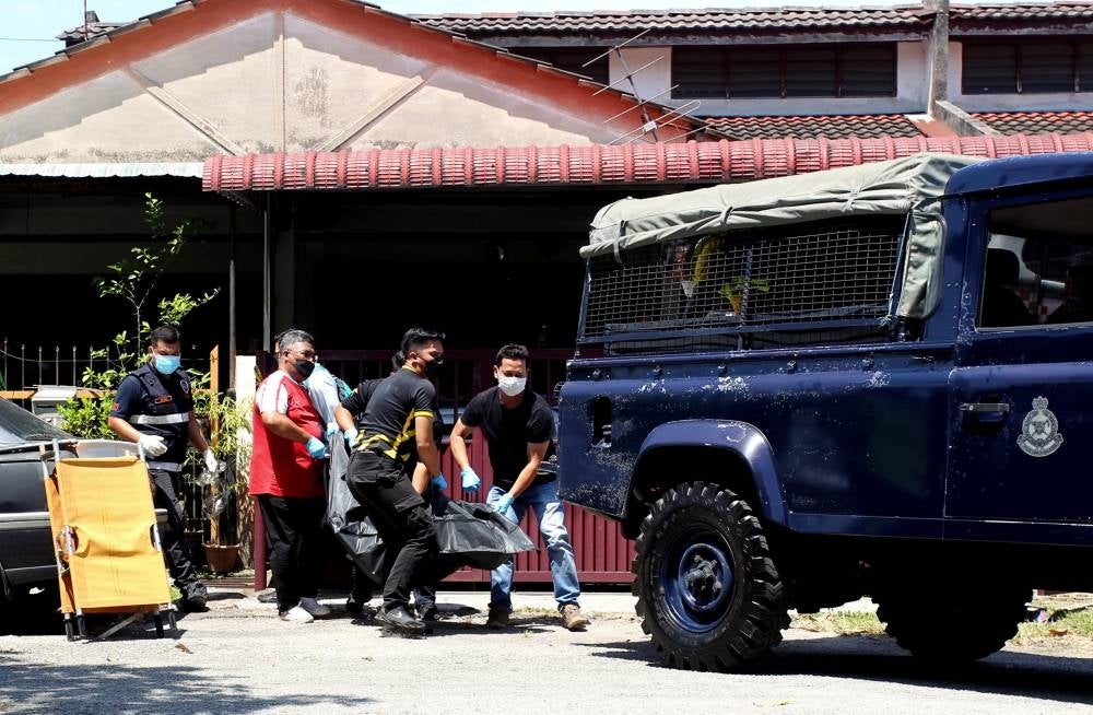 Yesterday, the victims were found unconscious and covered in blood at their home in Taman Bercham Aman. Photo: BERNAMA FILE PIX