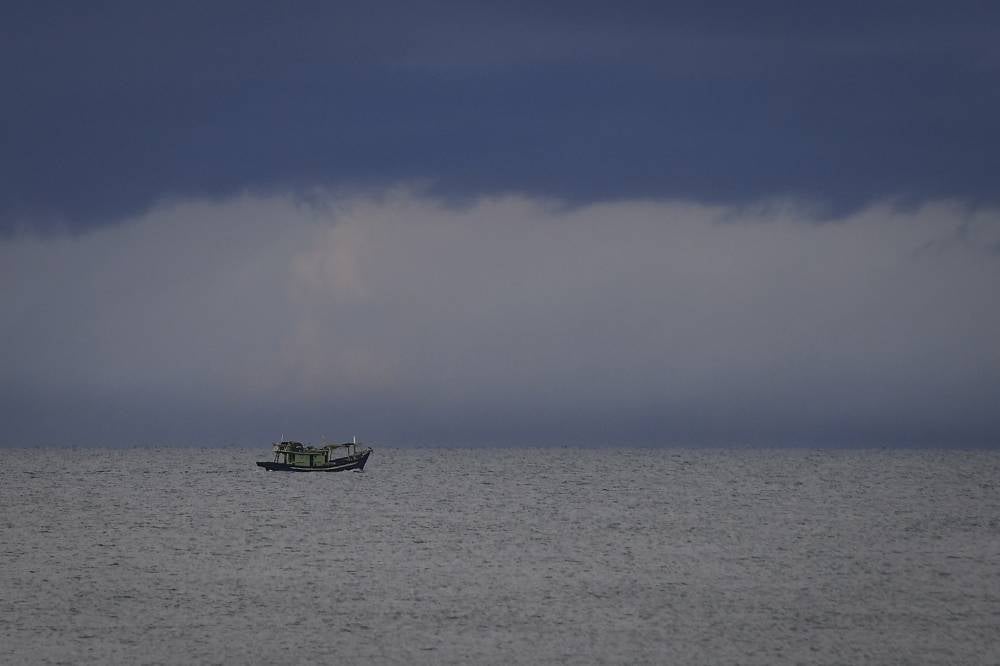 SESB senior general manager (asset management) Idris Mohd Noor said strong winds and heavy rain that hit the west coast and interior of Sabah since last Friday resulted in toppled electricity poles, fallen trees, soil erosion and flash floods in some areas. - Photo: BERNAMA